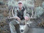 Dennis Lutge with mule deer